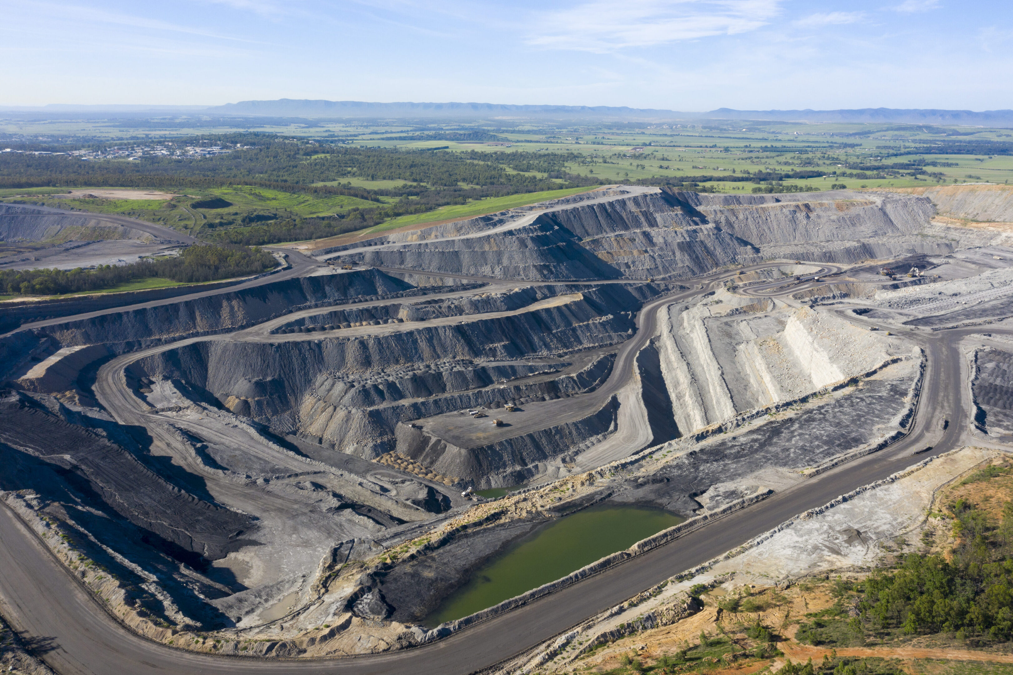 Open pit coal mine Open pit coal mine in the Hunter Valley area of New South Wales, Australia.